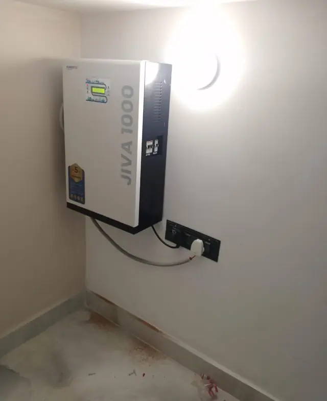 Wall-mounted lithium inverter battery unit in a clean utility room