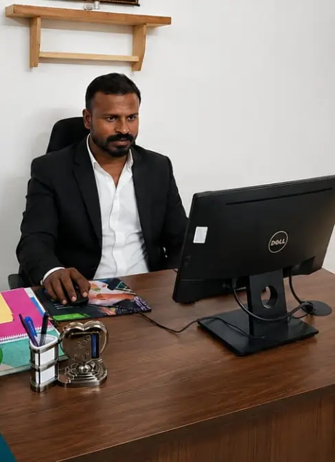 S. Vijil Selvakumar, Managing Director of Winzone, at his office desk